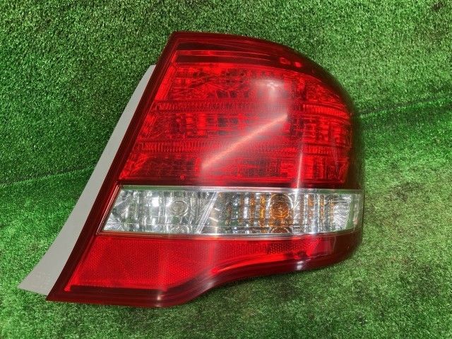 カローラアクシオ NZE144 右テールランプ・テールライト X コイト 12-545 81550-12B40 1F7
