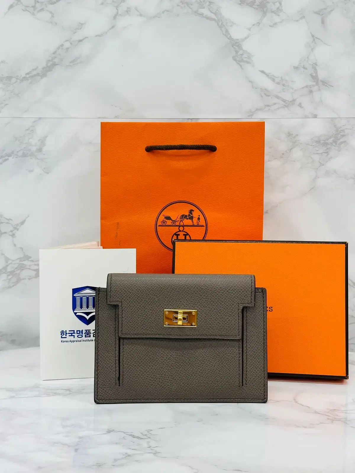 エルメス ケリー ポケット コンパクト 財布 エトープ ゴールド