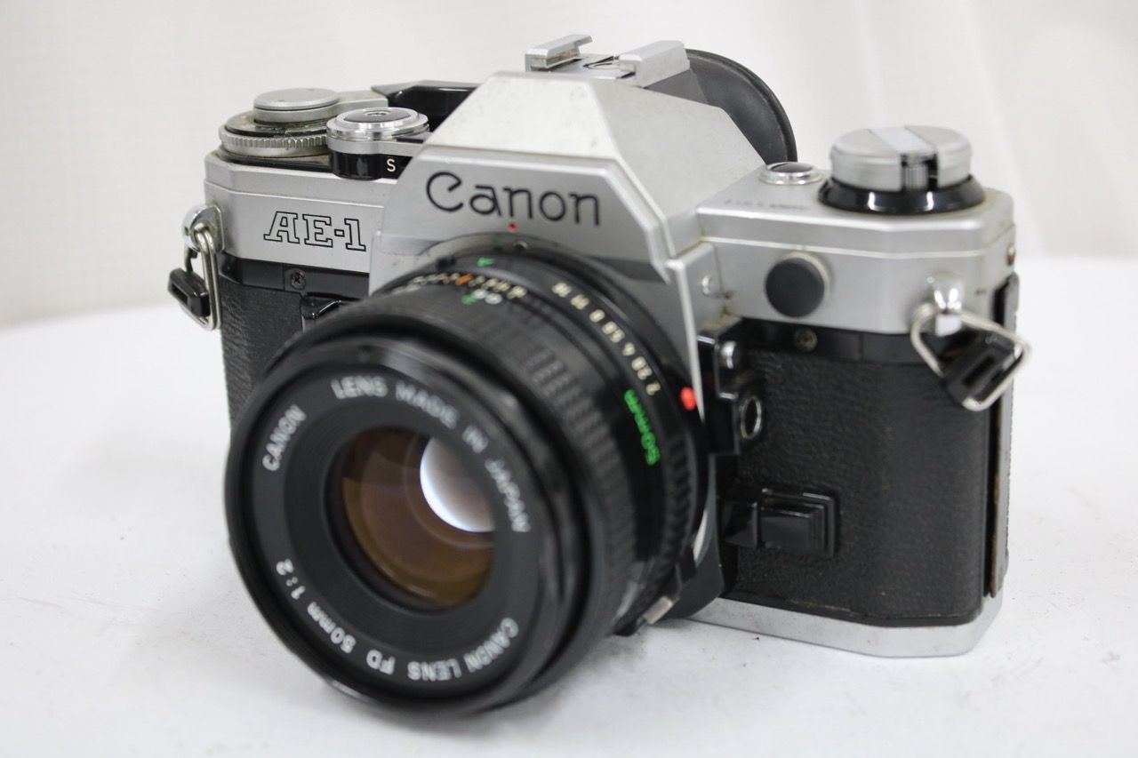 【返品保証】 キャノン Canon AE-1 NEW FD 50mm F2 ボディレンズセット e13131