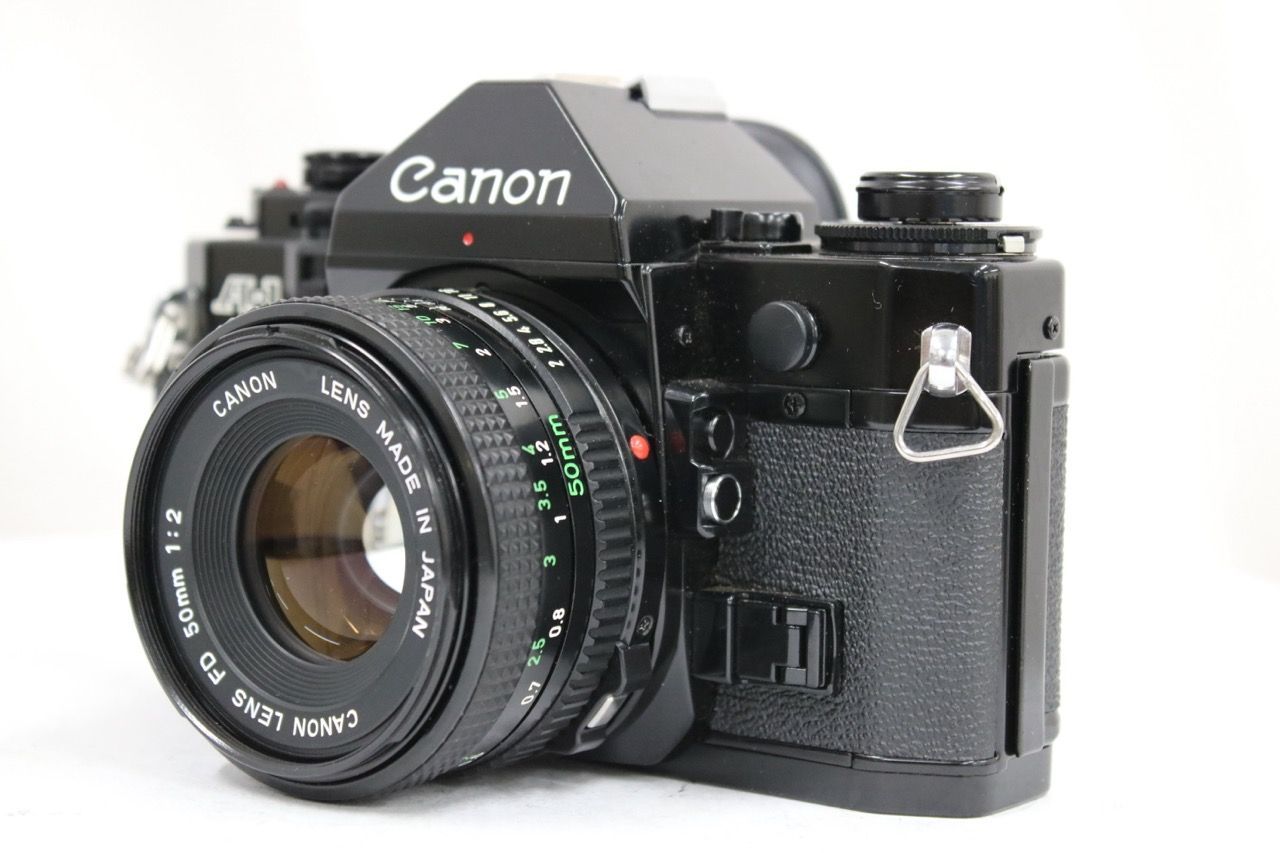 【返品保証】 キャノン Canon A-1 NEW FD 50mm F2 ボディレンズセット e13234