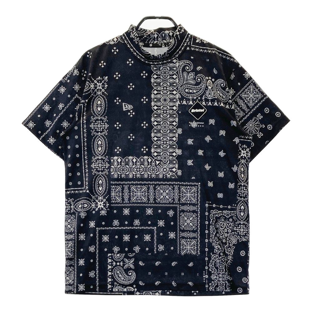 サイズ：LARGE NEW ERA ニューエラ × F.C.Real Bristol バックロゴ モックネック半袖Tシャツ ペイズリー柄 ブラック系 [240101701325] ゴルフウェア メンズ ストスト