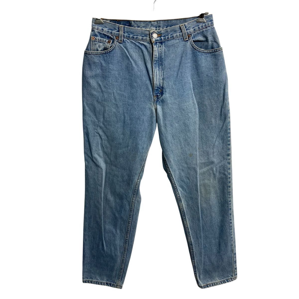 90s USA製 Levi's 550 デニムパンツ 16 ライトブルー リーバイス ジップアップ 99年製 紙タグ リラックスフィット ジーンズ 2605-110