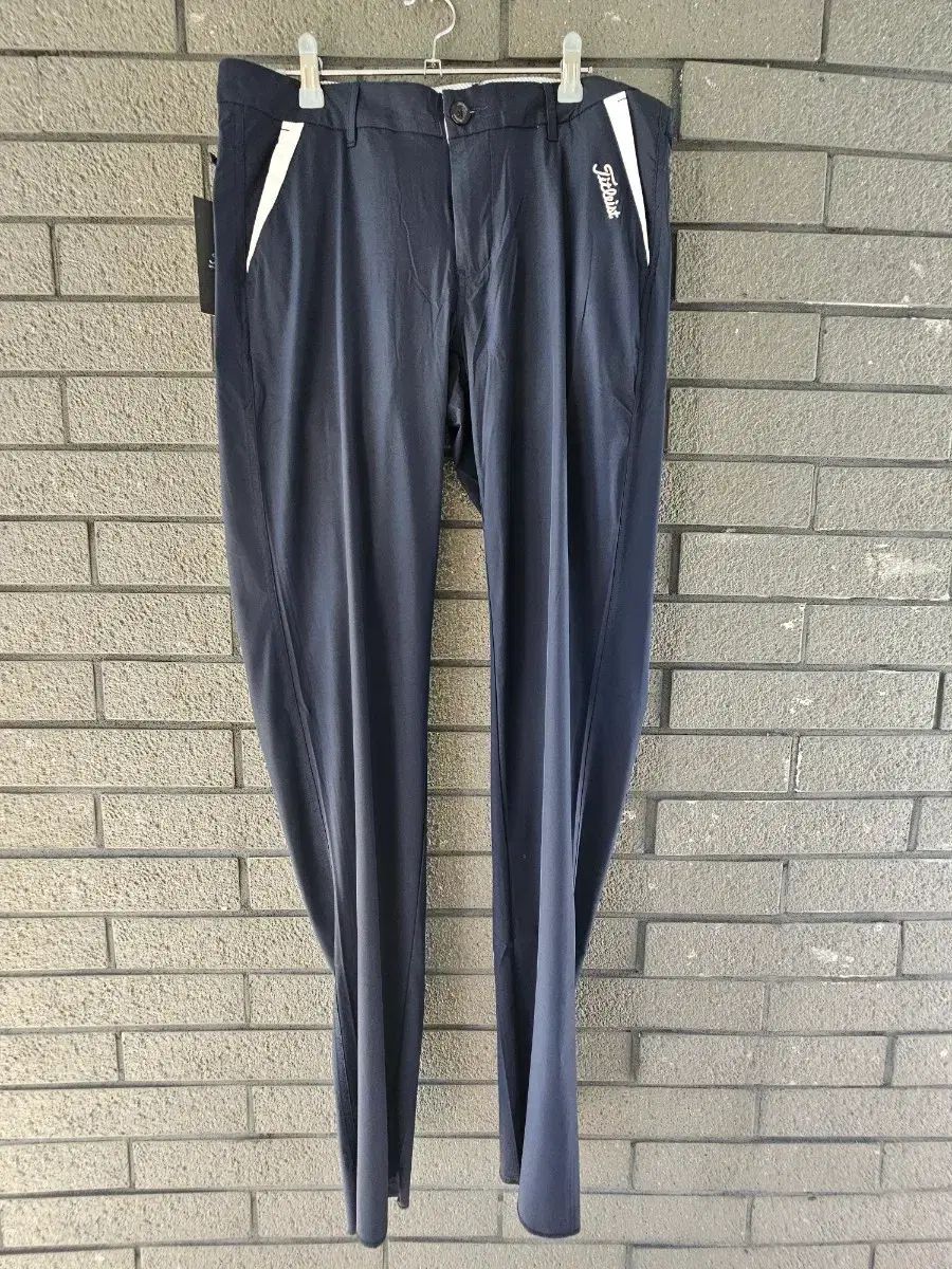 (新品) Titleist(タイトリスト) ゴルフパンツ ネイビー