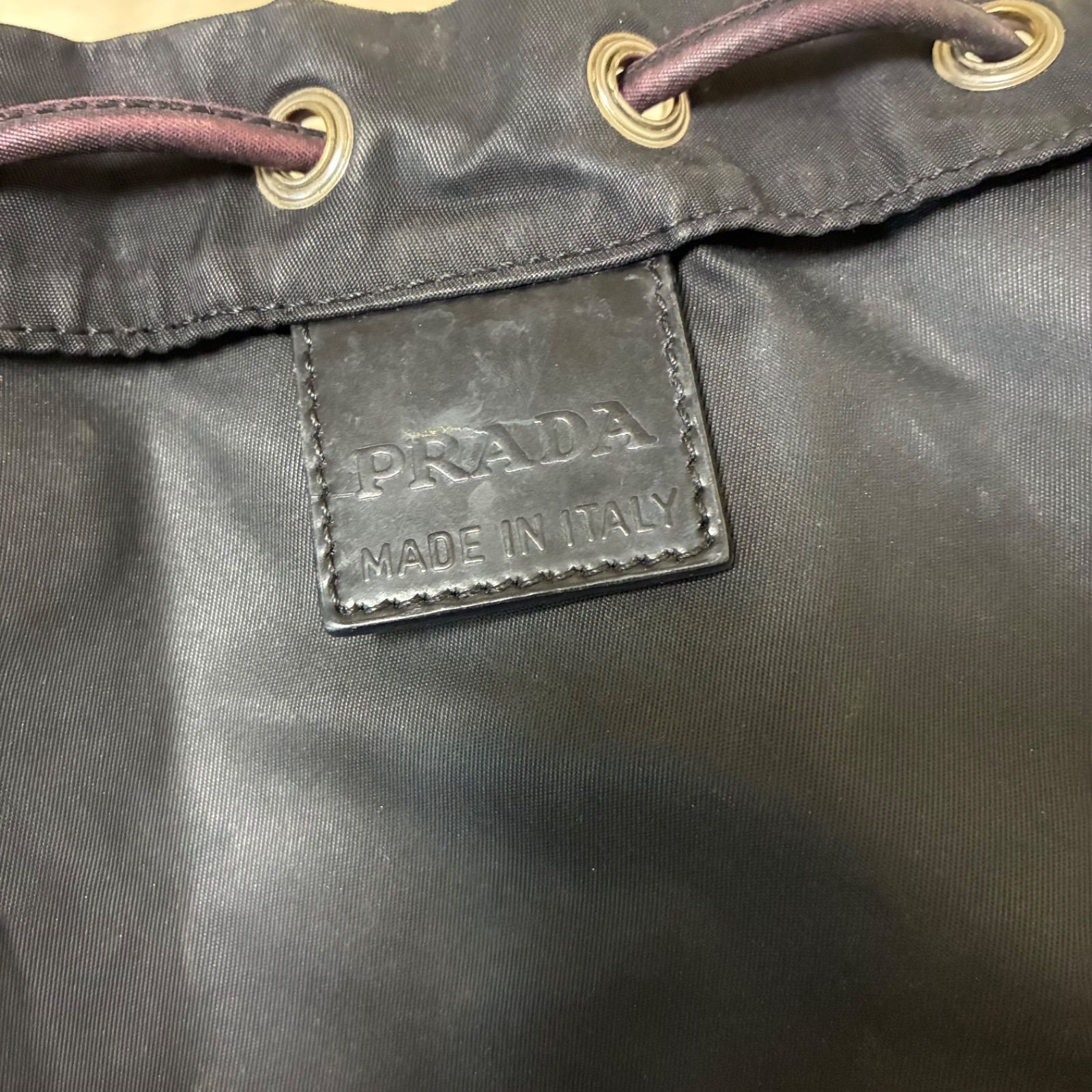 プラダ PRADA 三角ロゴプレート ブラックナイロンレザー 巾着ポーチ