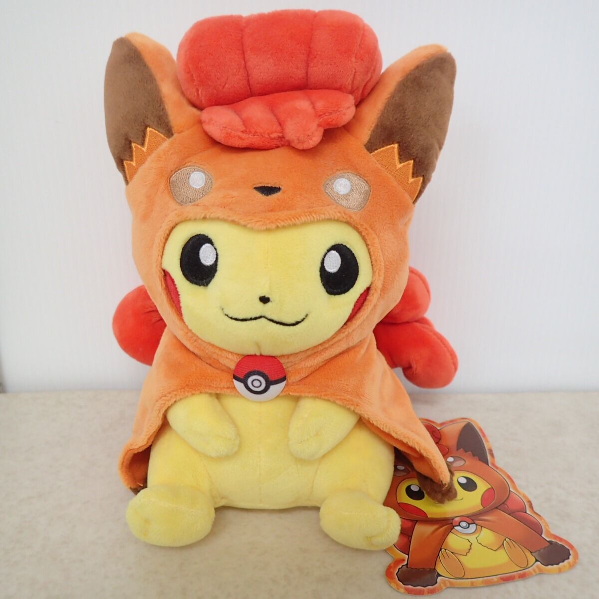 ポケモンセンター ぬいぐるみ ロコンポンチョのピカチュウ 紙タグ付き