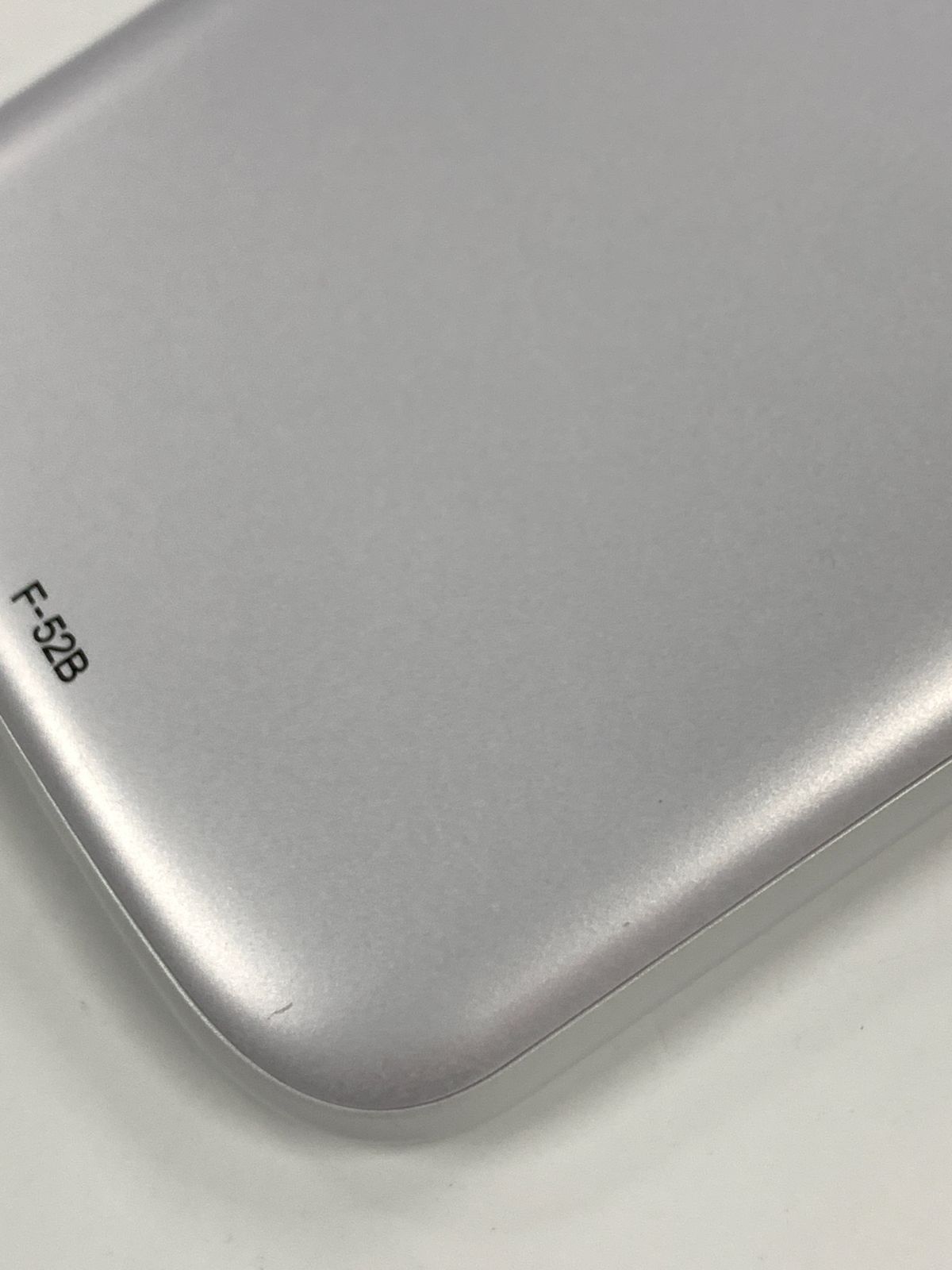 docomo らくらくスマホ F-52B ホワイト(ジャンク) - メルカリ