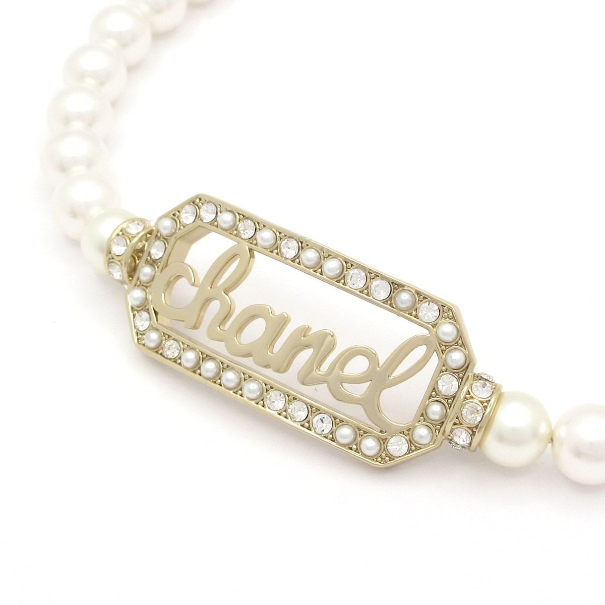 CHANEL(シャネル) チョーカー美品 - ゴールド×アイボリー×クリア ロゴ
