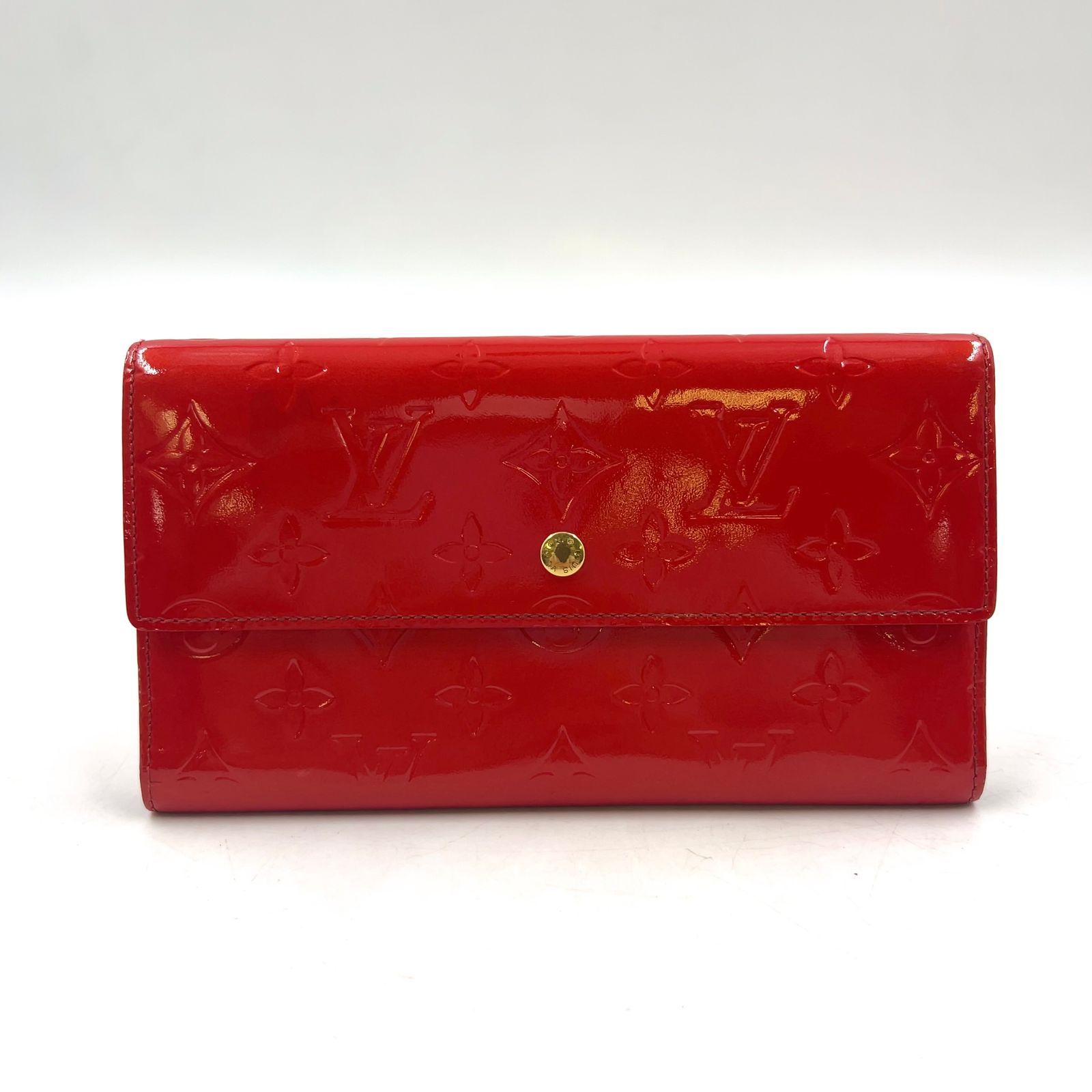 【新着】LOUIS VUITTON ポルトトレゾール インターナショナル エピ エピ カスティリアンレッド エナメルレザー レッド 三つ折り長財布 ゴールド M63387