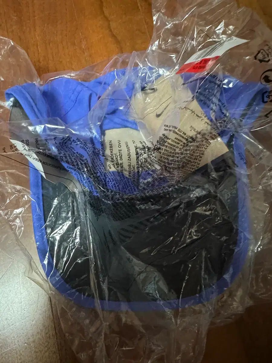 正規品新品 NIKE ドライフィット フェザーライト キャップ 帽子 パープル L/XL ランニング