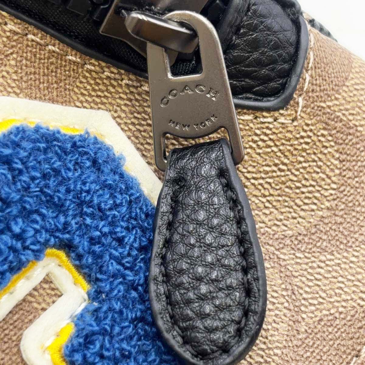 コーチ PEANUTS コラボ ボディバッグ スヌーピー COACH シグネチャー