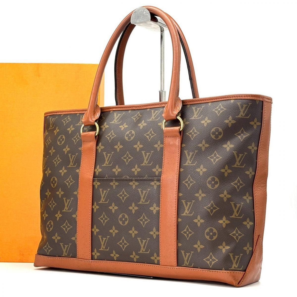【余裕は革に刻まれる】　LOUIS VUITTON　トートバッグ モノグラム ウィークエンドPM A4収納可 レザー　ブラウン