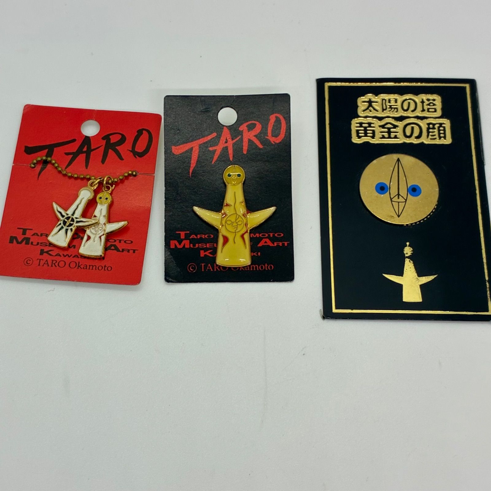 岡本太郎 太陽の塔グッズ『黄金の顔 記念カード 』『ボールチェーン キーホルダー』『ピンバッジ』