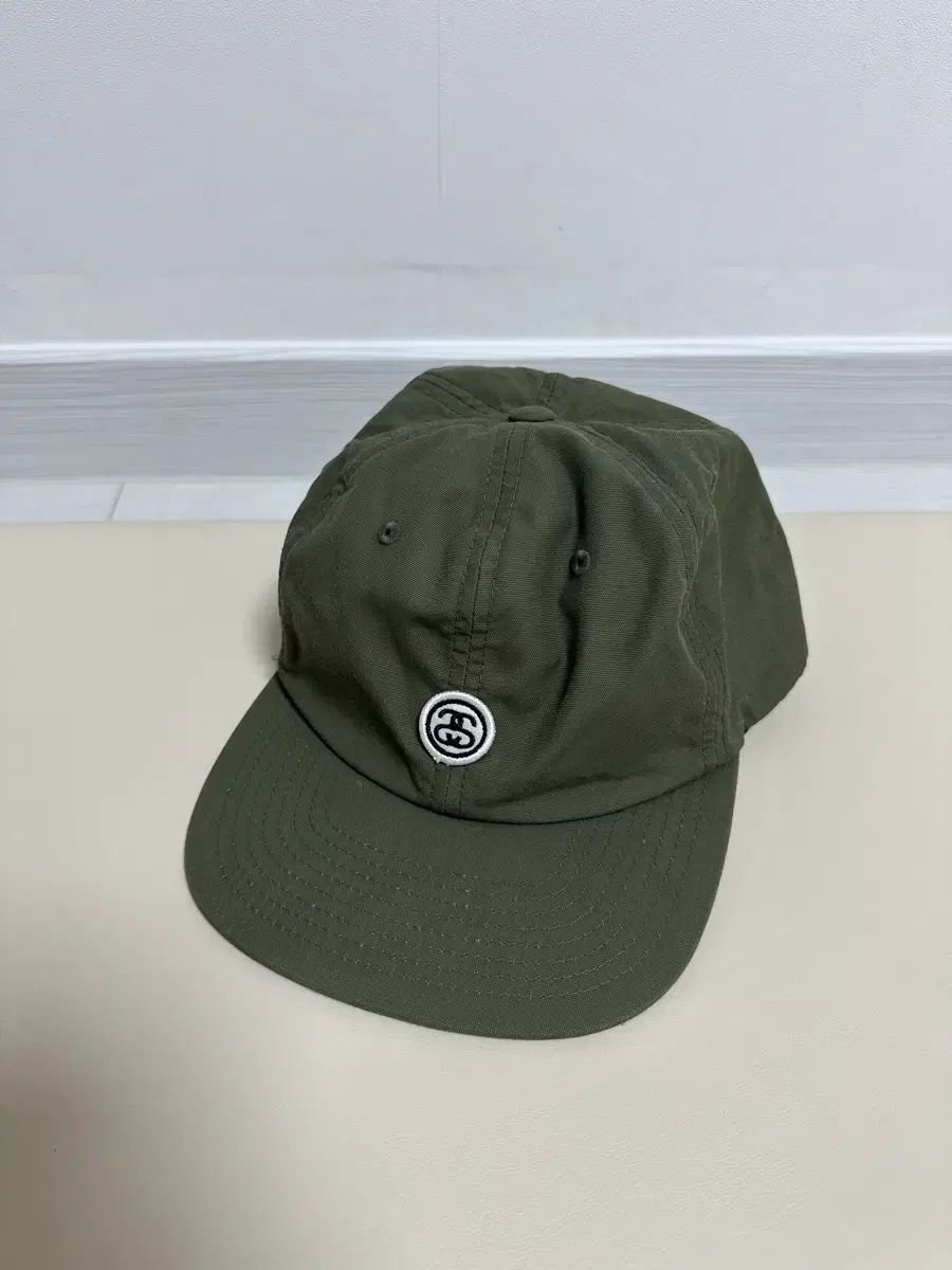新作入荷，得価 STUSSY オリーブ カラー ニュー チャンプ キャップ