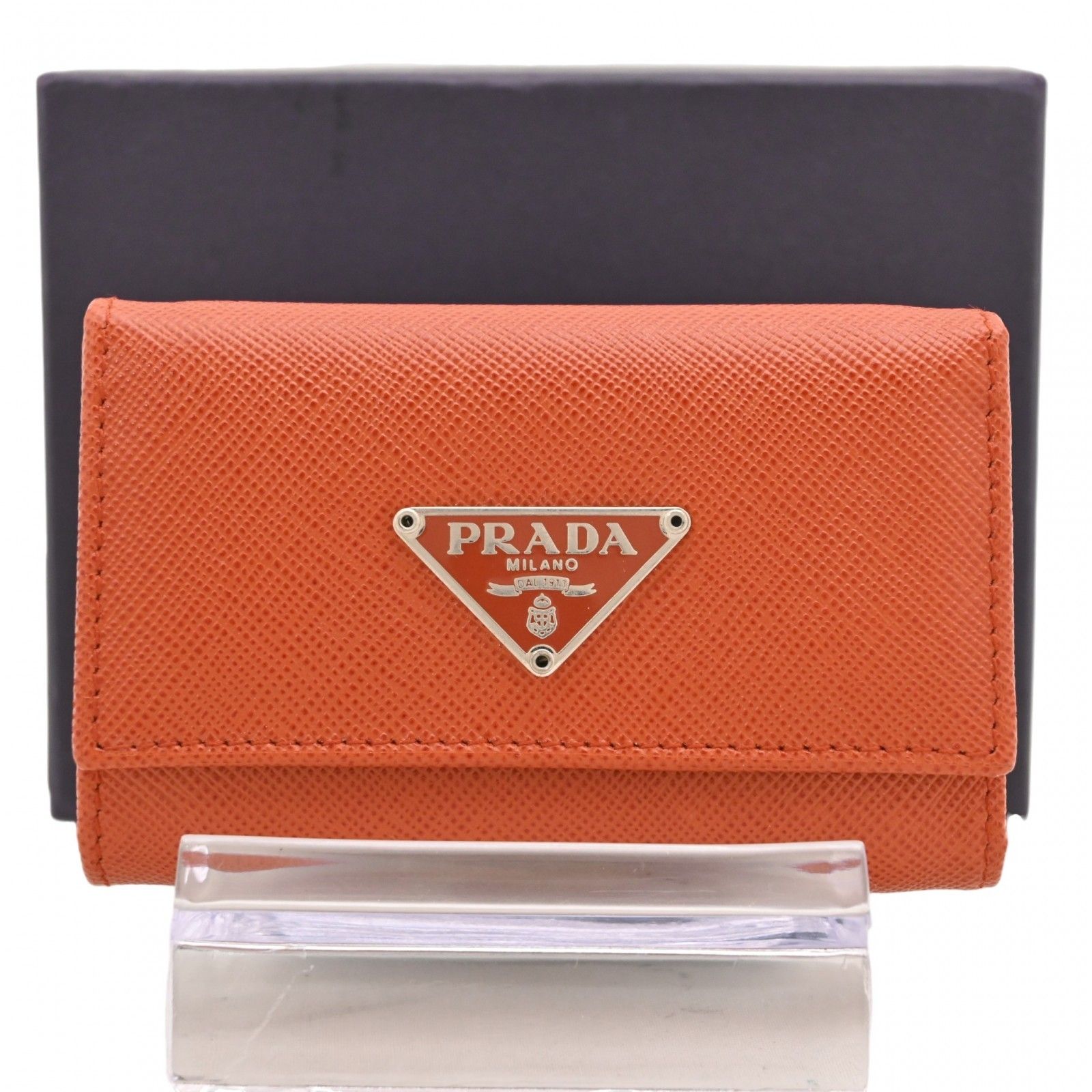 【中古】プラダ ロゴプレート レザー 6連 キーケース オレンジ シルバー金具 Aランク pr9917nf