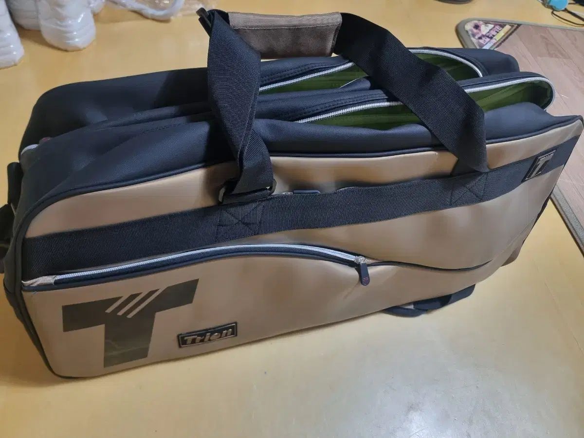 トライオン バドミントン バッグ