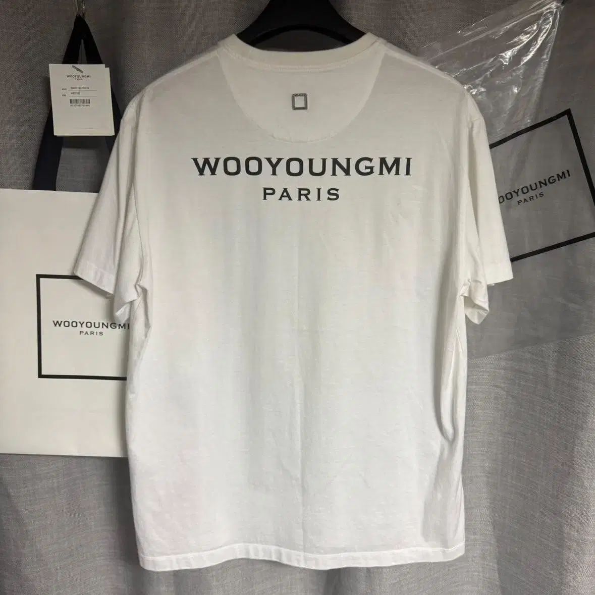 ((48)) ウーヨンミ バックロゴ 半袖 26,724円