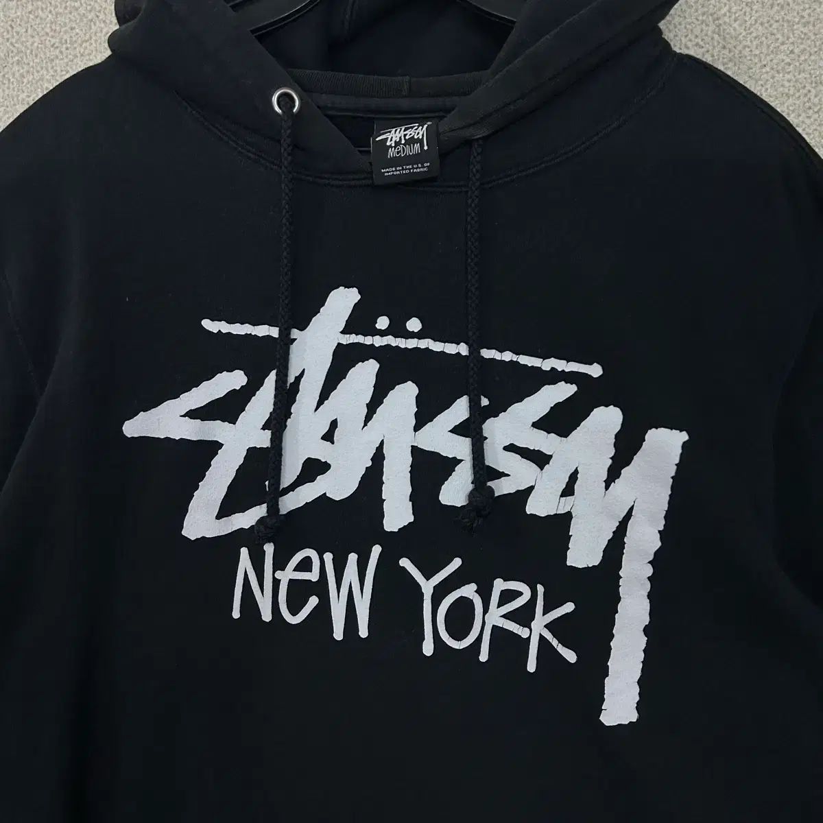 M) STUSSY NEW YORK ビックロゴ フードTシャツ - メルカリ