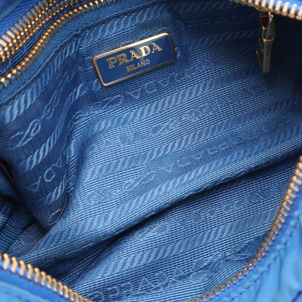 PRADA (プラダ) トライアングルロゴプレート ナイロンポーチ ブルー