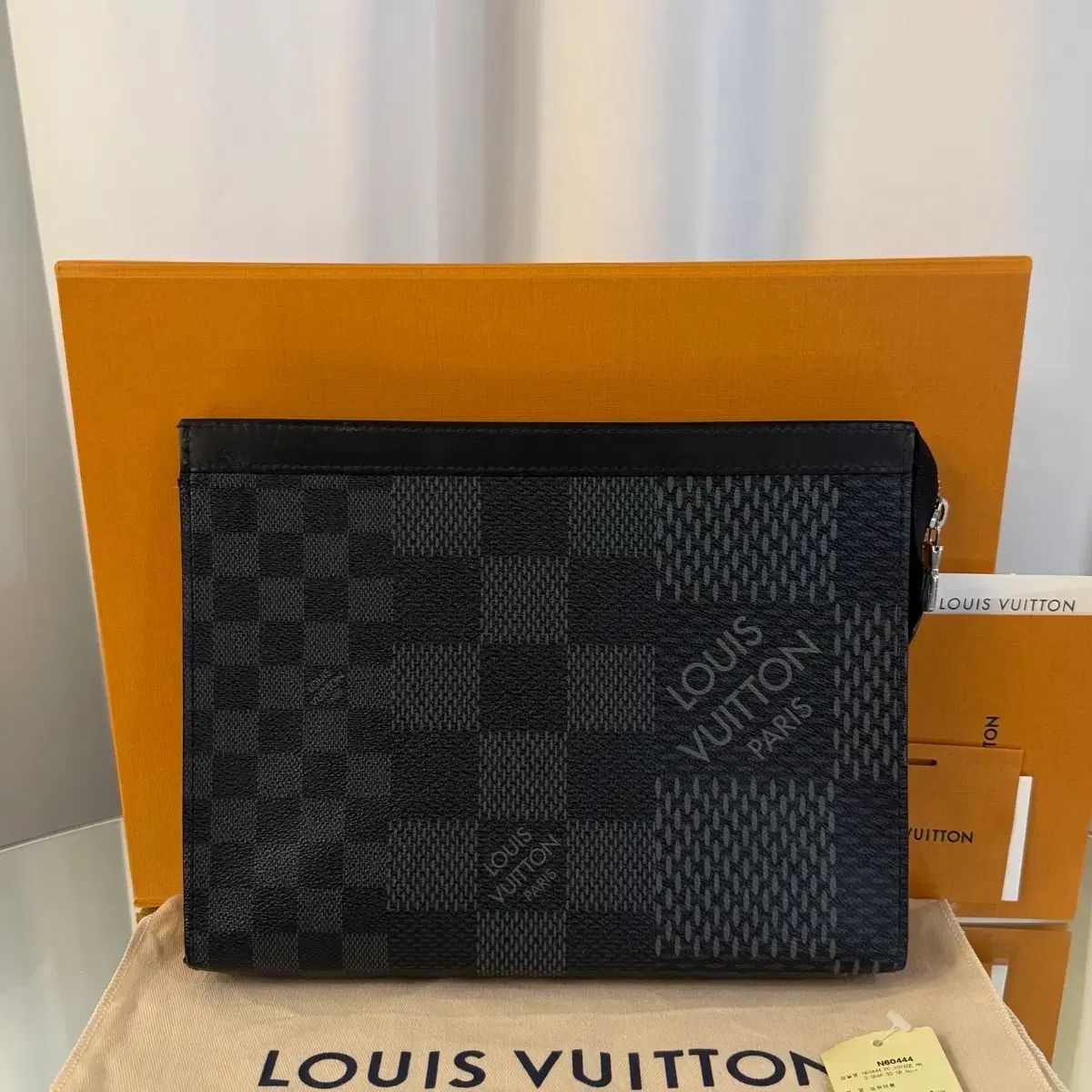 購入レシート Louis Vuitton ダミエ グラファイト ボヤージュ クラッチバッグ N60444