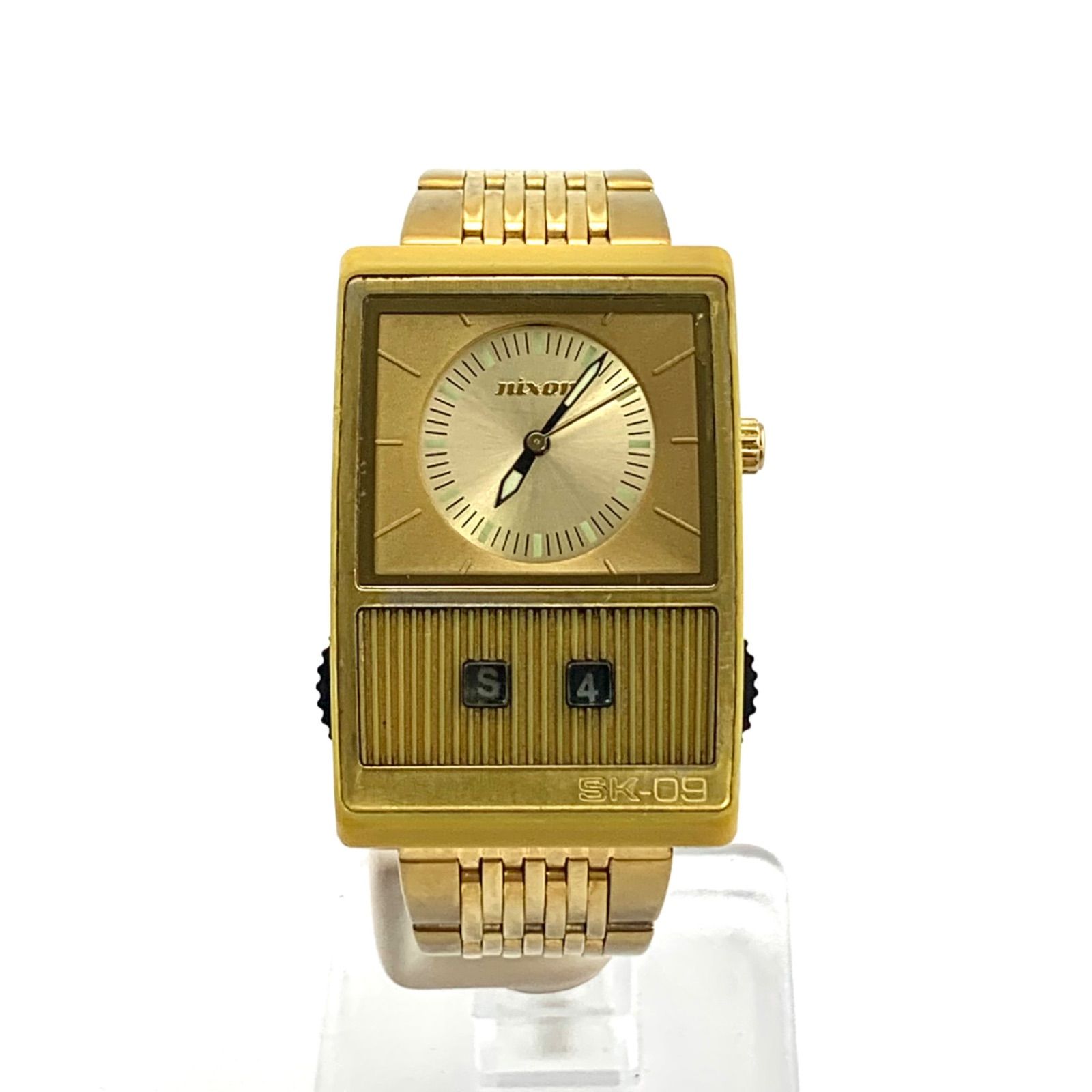中古】NIXON SK-09 7A ゴールドカラー 腕時計 - メルカリ