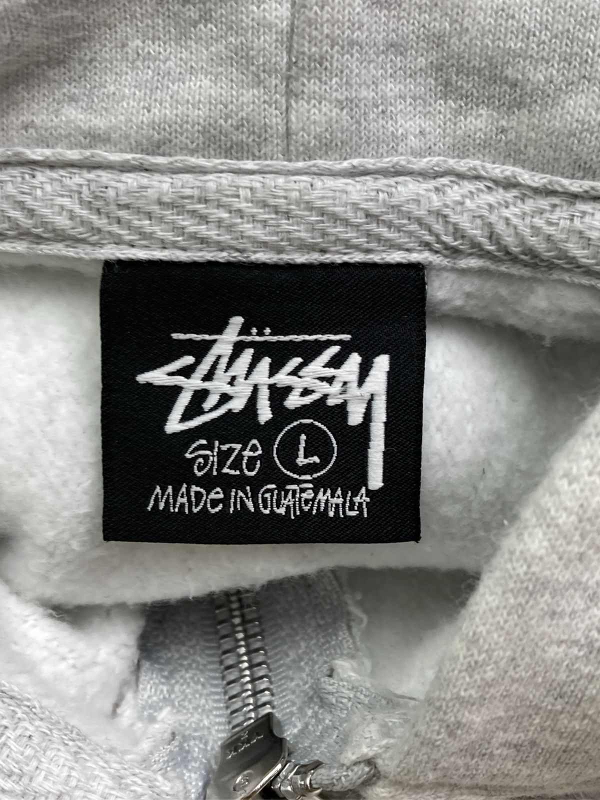グレー STUSSY ステューシー パーカー | STUSSY(ステューシー) - L 