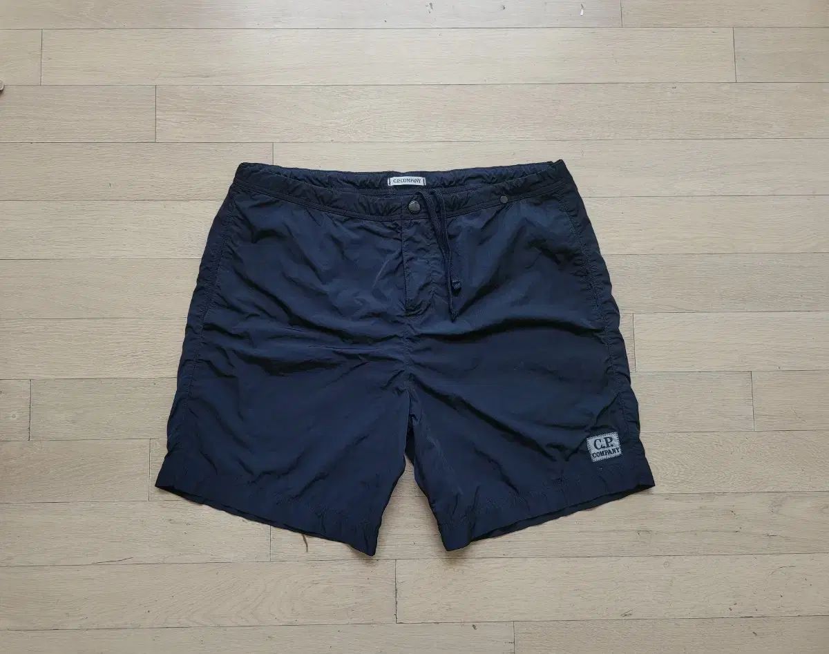 C.P. COMPANY シーピーカンパニー ロゴワッペン スイムパンツ cpハーフパンツ メンズ水着ズボン ウーブンハーフパンツ 17,339円