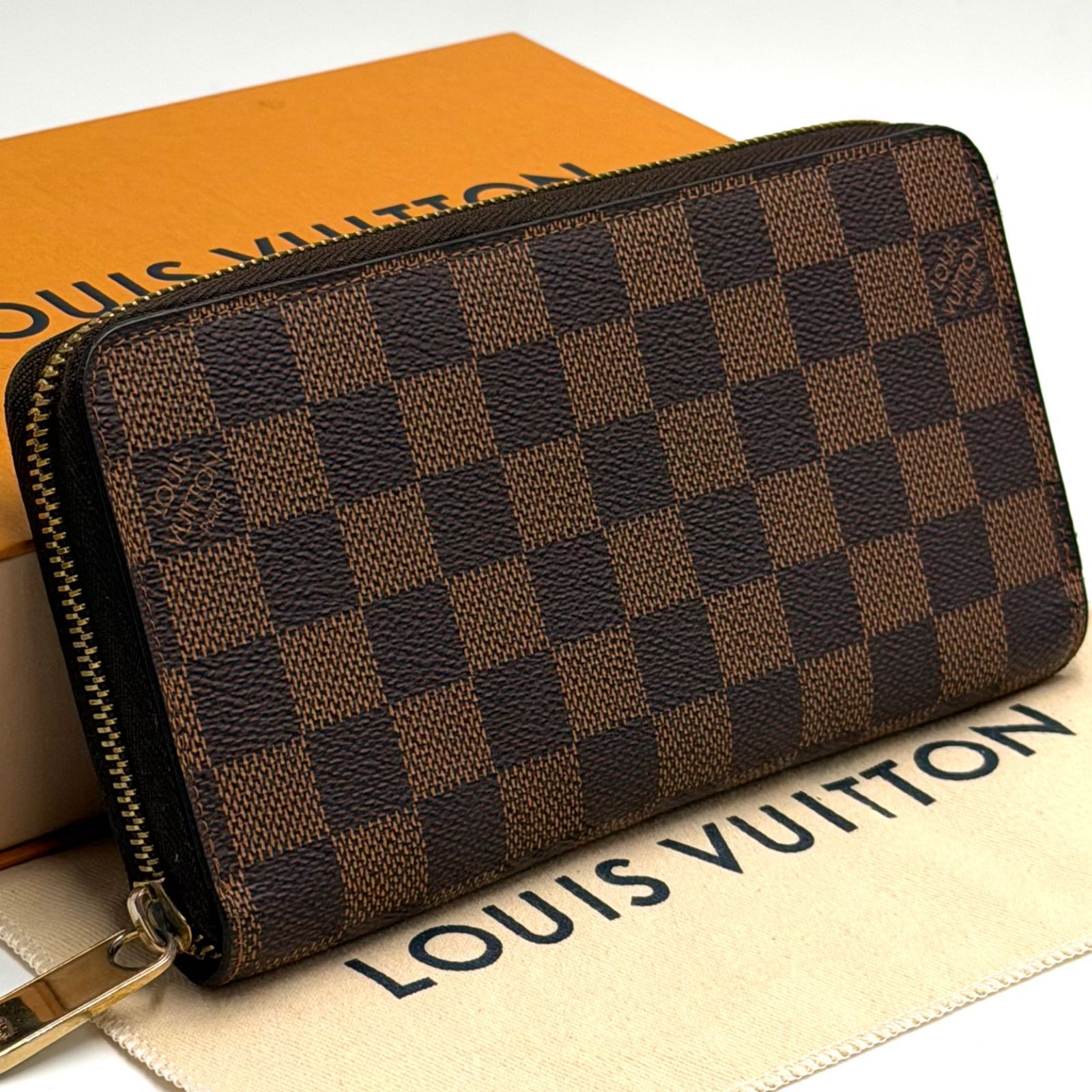 ルイヴィトン LOUIS VUITTON ダミエ エベヌ ジッピーウォレット ブラウン 長財布 ラウンドファスナー お札入れ ゴールド金具 男女兼用 N60015