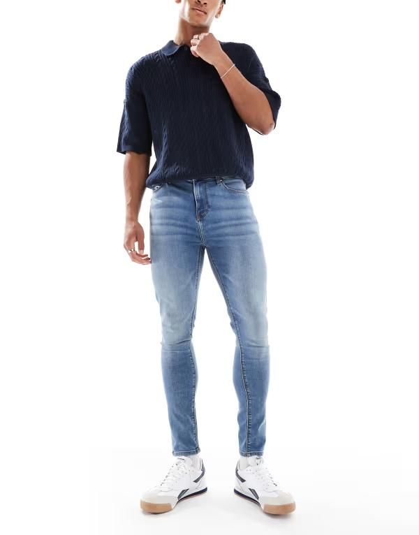 エイソス メンズ ボトムス デニムパンツ ジーンズ ASOS DESIGN power stretch jeans in mid wash Midwash Blue ブルー