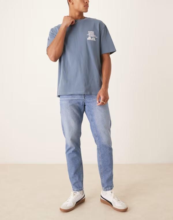 エイソス メンズ ボトムス デニムパンツ テーパードフィット ジーンズ ASOS DESIGN tapered fit jeans in light wash LIGHT WASH BLUE ブルー