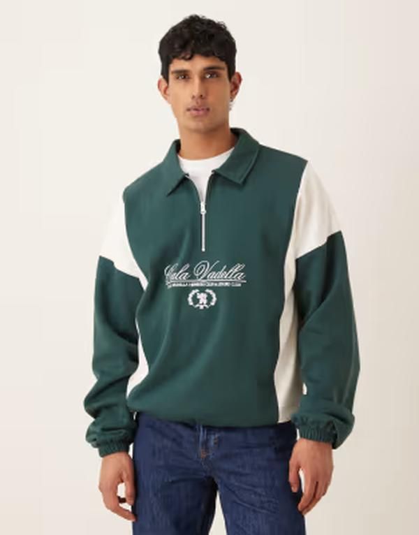 エイソス メンズ アウター パーカー・スウェット ハーフジップ シャツ ASOS DESIGN relaxed half zip sweatshirt with cut sew text panels in darkest spruce グリーン