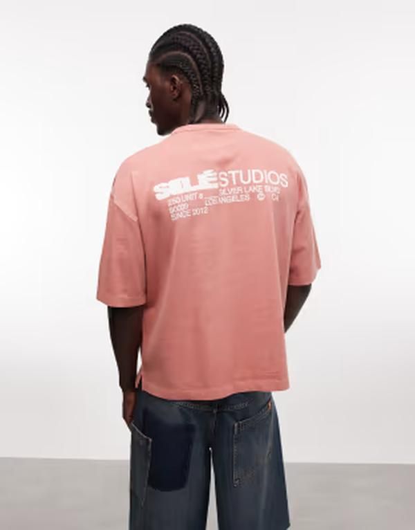 エイソス メンズ トップス Tシャツ グラフィック ASOS DESIGN boxy oversized Tshirt with text graphic in washed Brick dust ピンク