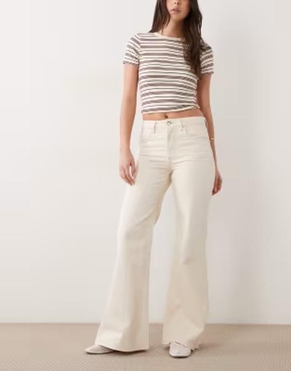 マンゴ レディース ボトムス デニムパンツ コットン ジーンズ Mango Theita 100 cotton flared jeans in cream クリーム