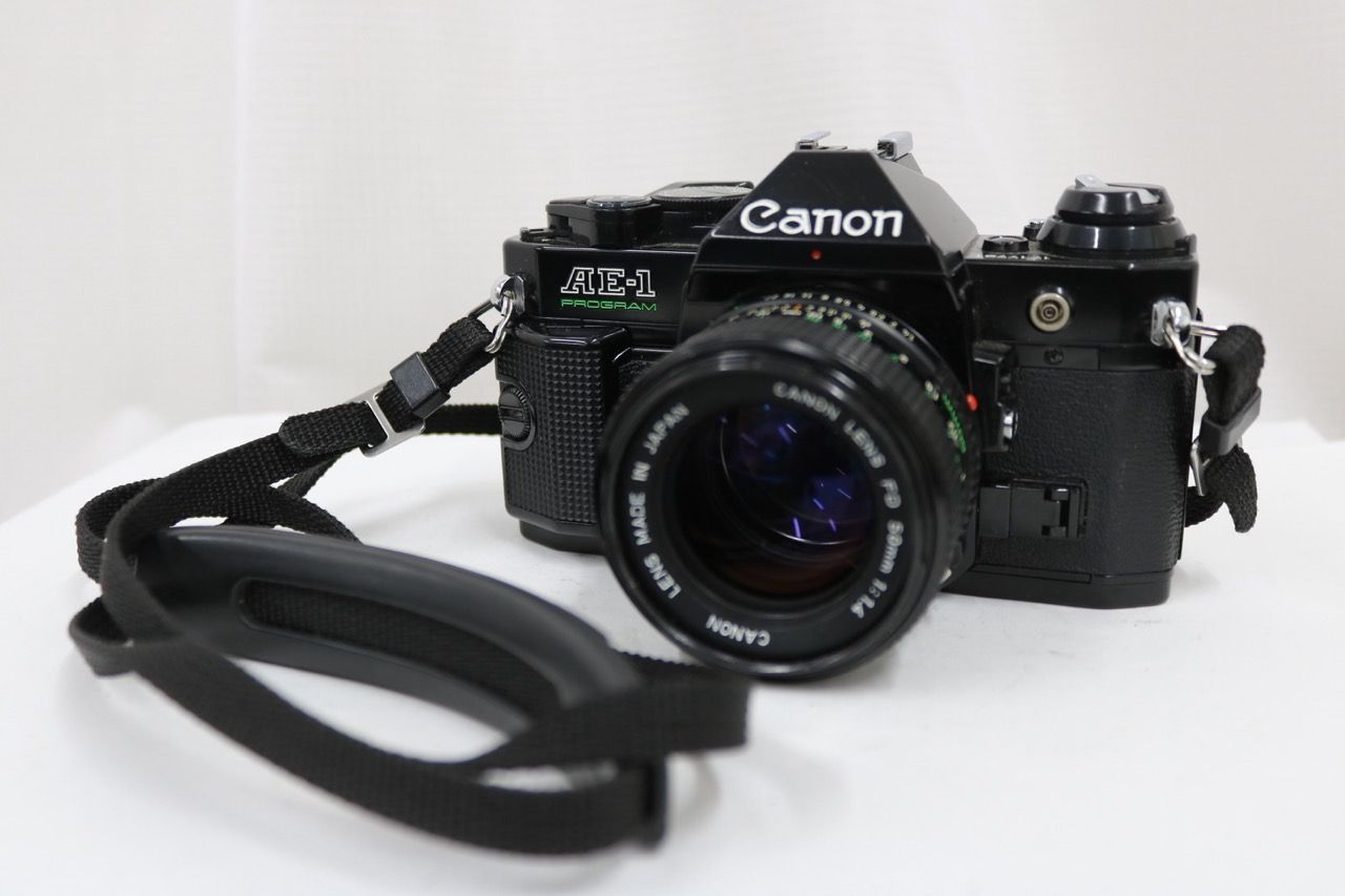 【返品保証】 キャノン Canon AE-1 PROGRAM ブラック NEW FD 50mm F1.4 ボディレンズセット e13503