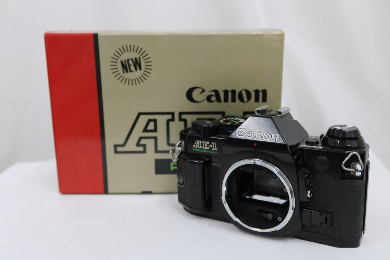 【返品保証】 【元箱付き】キャノン Canon AE-1 PROGRAM ブラック ボディ e13518