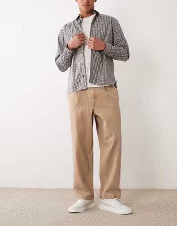 エイソス メンズ ボトムス デニムパンツ ジーンズ ASOS DESIGN relaxed tapered jeans in washed brown with pleats Washed Brown ブラウン