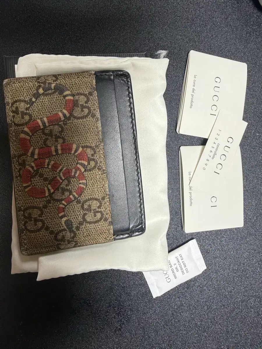グッチ スネーク カード財布 11,971円