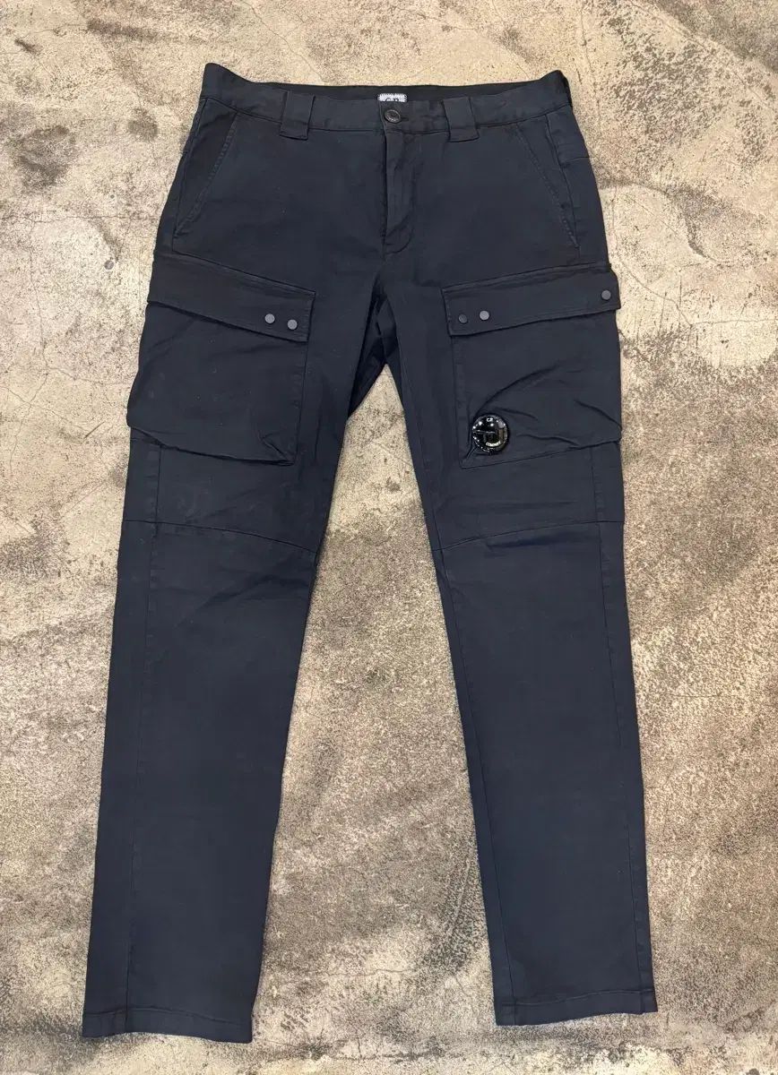 C.P. COMPANY シーピーカンパニー ガーメントダイング レンズワッペン カーゴパンツ