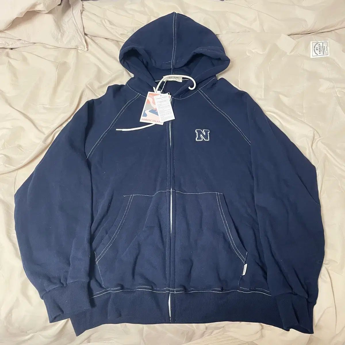 衣類 ノルディック Island DW Nロゴ ジップアップ (L)