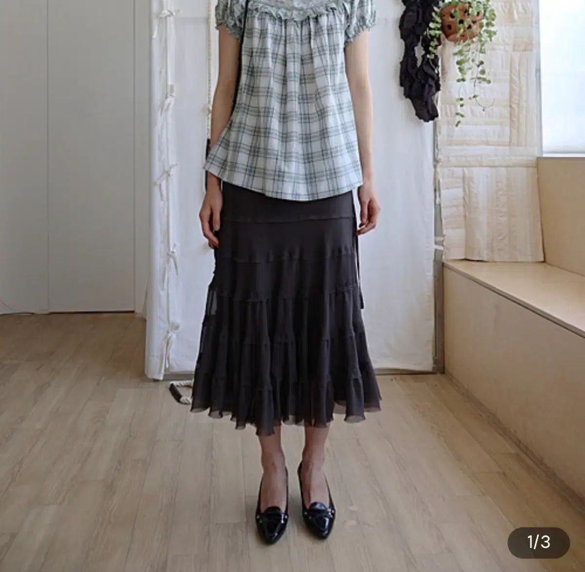 コロシン NORA SHIMMERING SKIRT