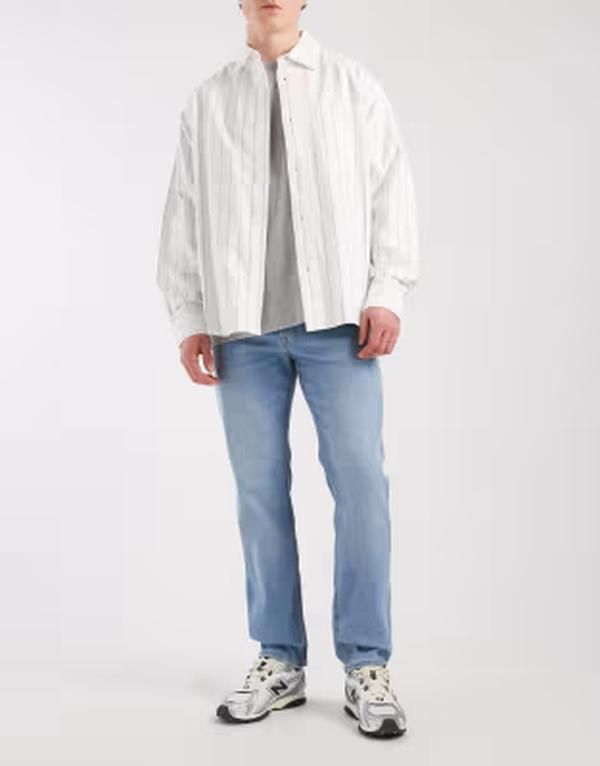 ジャック アンド ジョーンズ メンズ ボトムス デニムパンツ レギュラーフィット ジーンズ Jack Jones Clark regular fit jeans in mid Blue ブルー