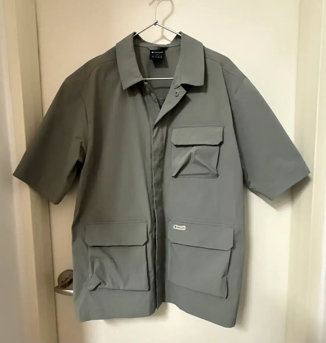 スノーピークのカーキ色アウトポケットシャツ95(M)