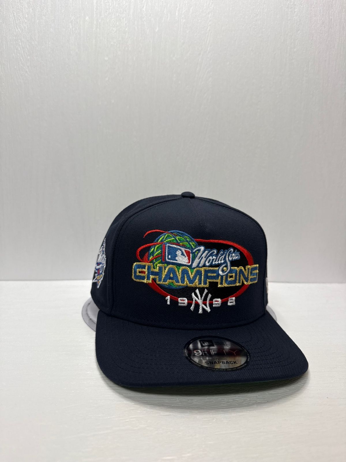 ニューエラ ニューヨークヤンキース ワールドシリーズチャンピオンズ1998 9fifty A-FRAME スナップバックキャップ ネイビーカラー