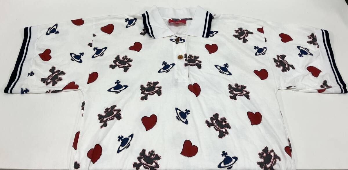 VIVIENNE WESTWOOD ヴィヴィアン・ウエストウッド 16-12-332001 半袖ポロシャツ 総柄 オーブ ハート サイズ00 ホワイト 日本製 VIVIENNE WESTWOOD ヴィヴィアン・ウエストウッド 16-12-332001 半袖ポロシャツ 総柄 オーブ ハート サイズ00 ホワイト 日本製