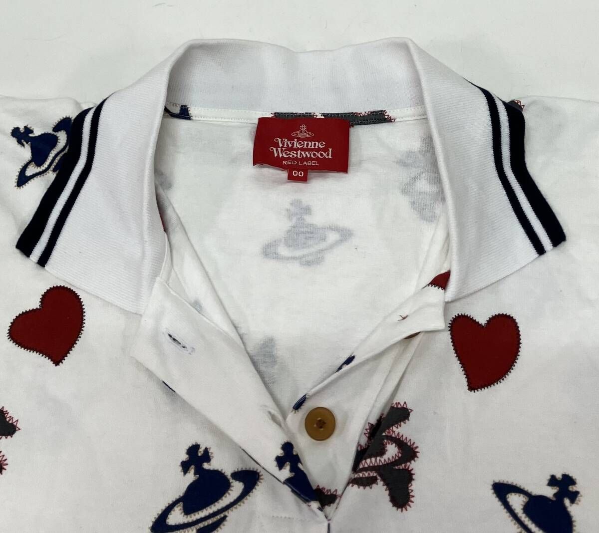 VIVIENNE WESTWOOD ヴィヴィアン・ウエストウッド 16-12-332001 半袖ポロシャツ 総柄 オーブ ハート サイズ00 ホワイト 日本製 VIVIENNE WESTWOOD ヴィヴィアン・ウエストウッド 16-12-332001 半袖ポロシャツ 総柄 オーブ ハート サイズ00 ホワイト 日本製