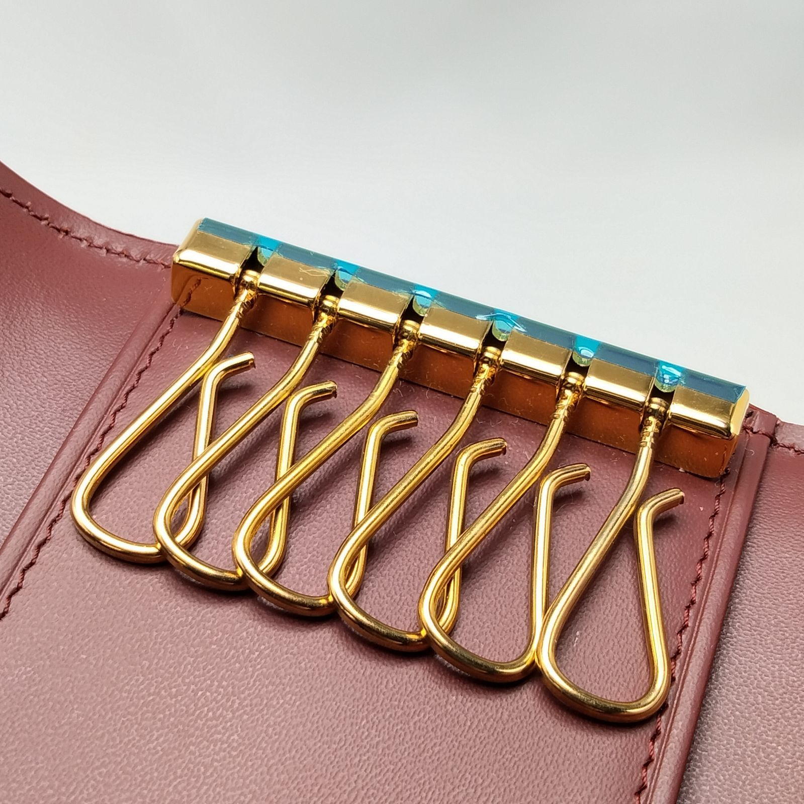 Cartier カルティエ　ボルドー　マスト　レザーオーバル型　キーホルダー ✨️Cartier✨️カルティエ マストライン レザー キーケース ボルドー