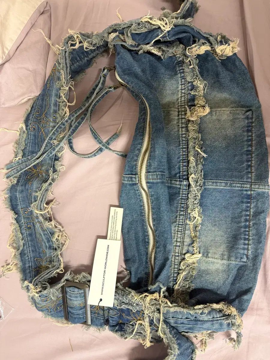 sculptor Destroyed Denim Duffel Bag