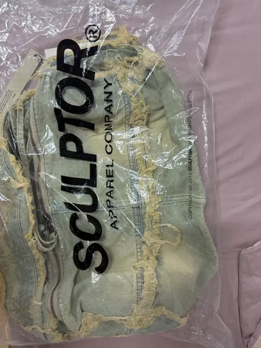 sculptor Destroyed Denim Duffel Bag