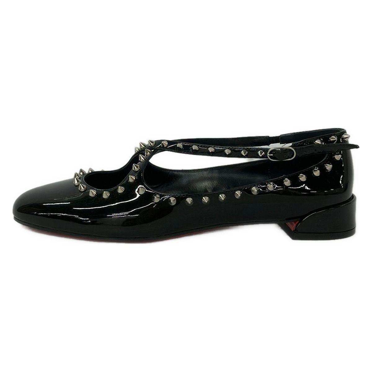 CHRISTIAN LOUBOUTIN(クリスチャンルブタン) フラットシューズ 37 1/2 レディース - 黒 スタッズ レザー