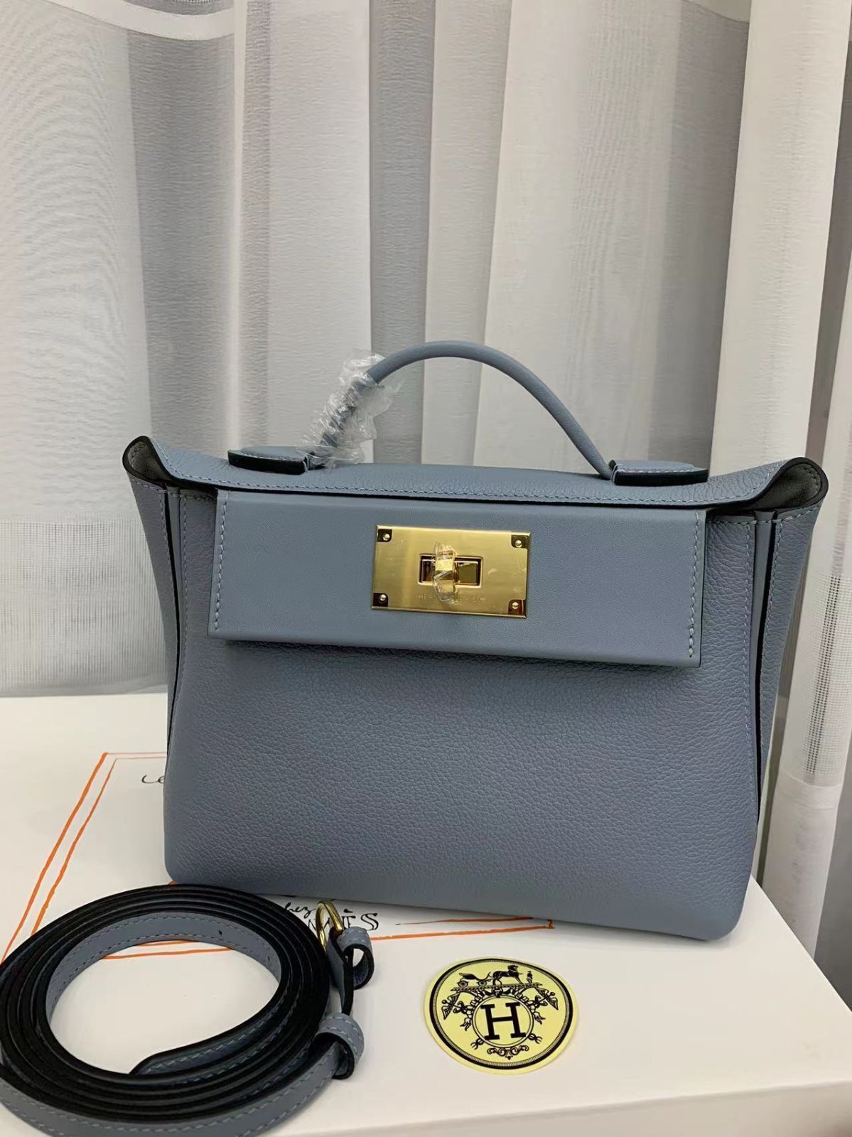 エルメス リネンブルーのレディースハンドバッグ