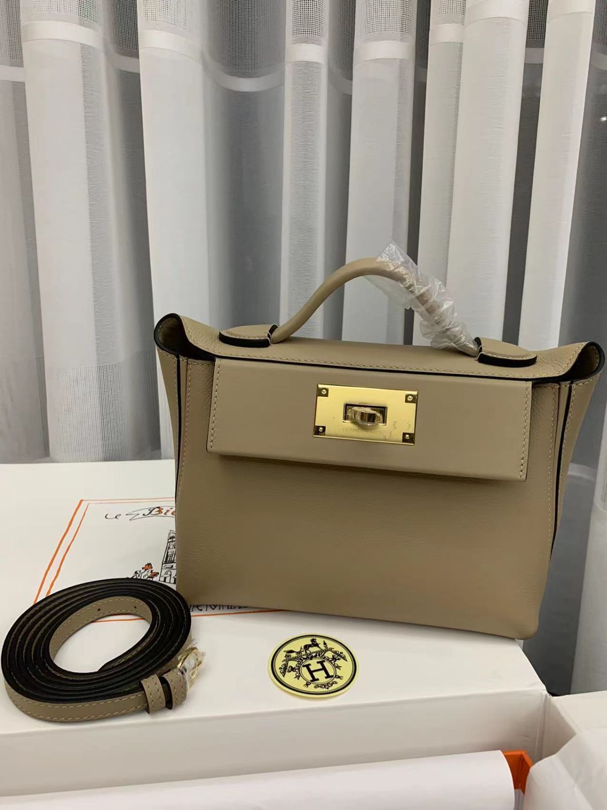 エルメス kelly グレーのレディースハンドバッグ